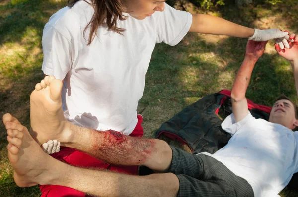 First aid treatment of injured patient