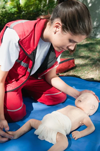 Woman paramedic on training procedure — Stock Photo, Image