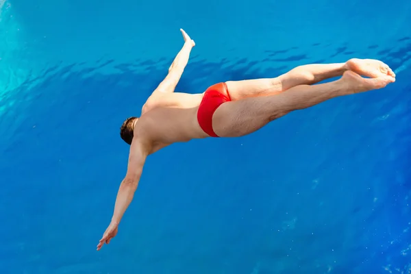 Diving competitor in air — Stock Photo, Image