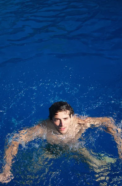 Attractive young man in water — Stock Photo, Image