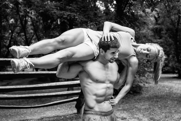 fitness couple exercising in nature