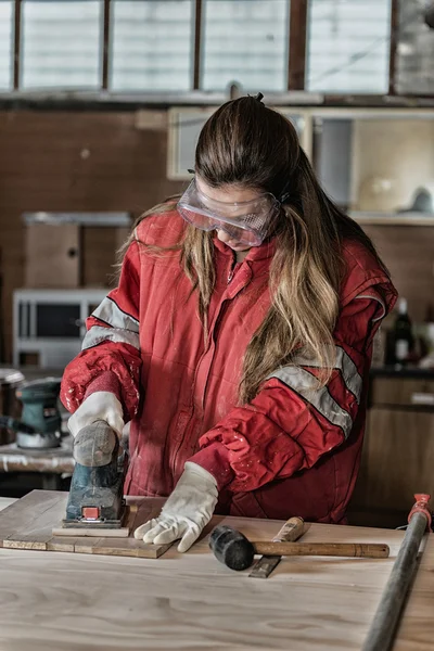 Woman in carpentry workshop Royalty Free Stock Images
