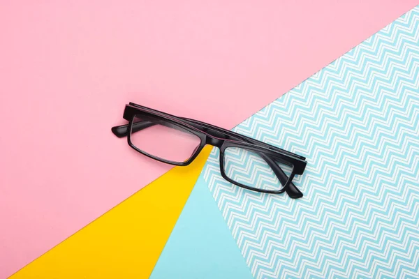 Szemüveg Pasztell Színű Háttérrel Felülnézet — Stock Fotó