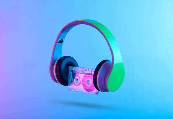 Stereo Headphones Audio Cassette Neon Vibrant Pink Blue Light Gradient — Stock Photo, Image