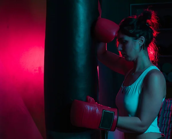 Tired Woman Boxer Boxing Gloves Leaning Punching Bag Red Blue — Stock Photo, Image