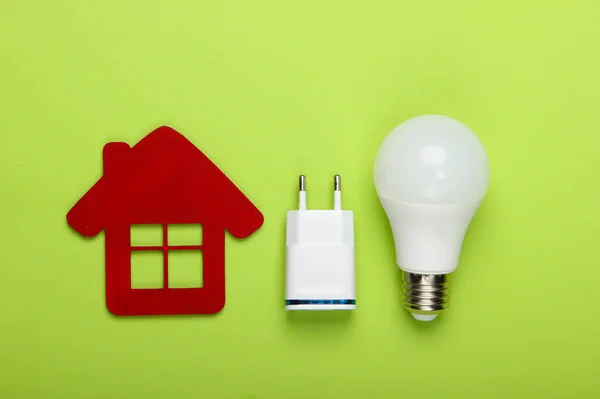 Smart House Concept Figurine House Energy Saving Light Bulb Charger — Stock Photo, Image