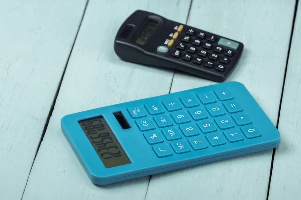 Twee Calculators Blauwe Borden — Stockfoto