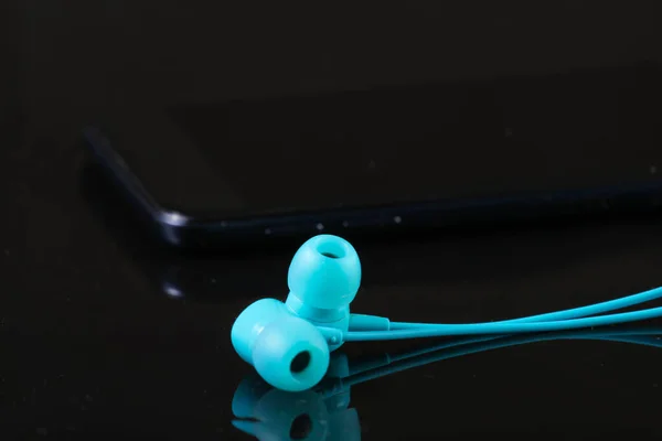 Blue Vacuum Earphones Smartphone Black Background Close — Stock Photo, Image