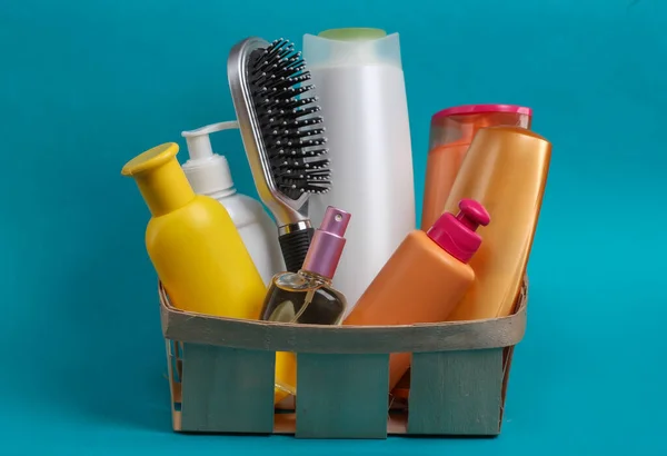 Bottles Cosmetics Shampoos Comb Wooden Basket Blue Background Beauty Products — Stock Photo, Image