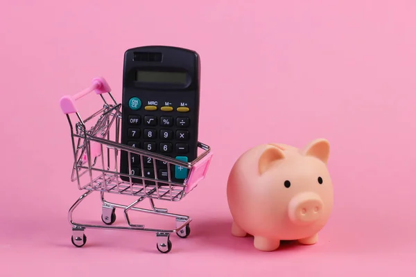 Shopping Trolley Piggy Bank Calculator Close Pink Pastel Background — Stock Photo, Image