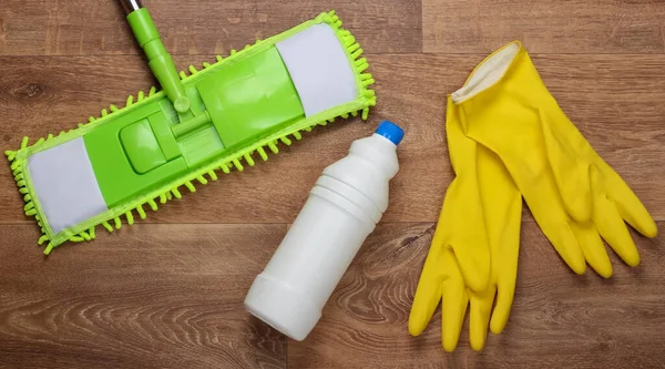 Cleaning Products Plastic Green Mop Gloves Bottle Detergent Wooden Floor — Stock Photo, Image