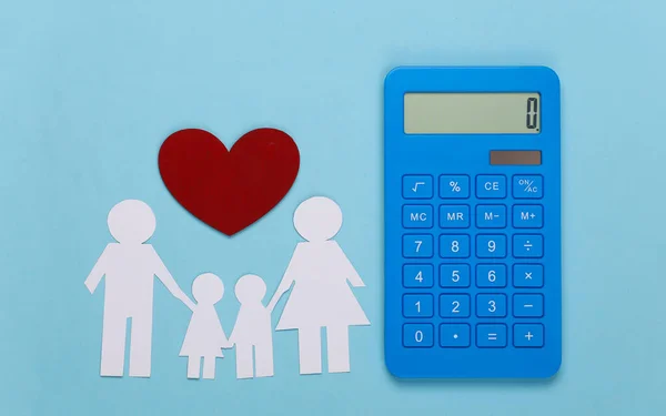 Paper happy family together with calculator on blue background. Calculation of family expenses, budget