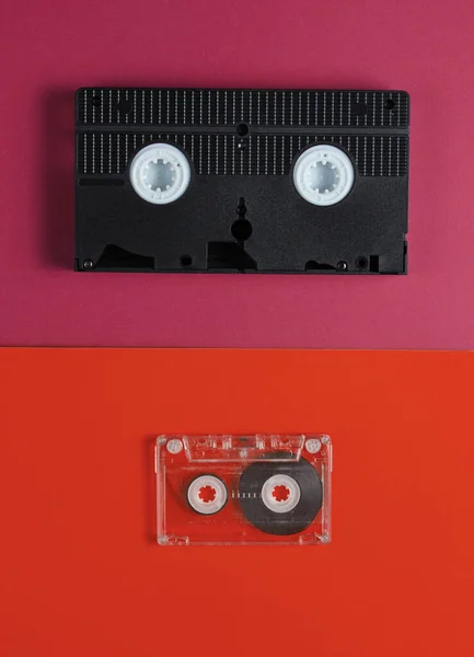 Pop Kultura Média Léta Audiotape Videokazeta Oranžovém Červeném Pozadí Horní — Stock fotografie