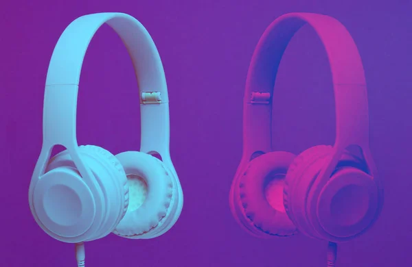 Two Headphones Purple Background Duotone Effect Copy Space — Stock Photo, Image