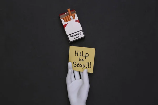 Smoking Addiction Help Stop Pack Cigarettes Mannequin Hand Black Background — Stock Photo, Image
