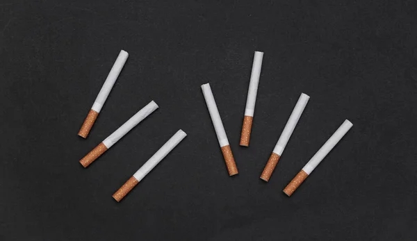 Muitos Cigarros Fundo Preto — Fotografia de Stock