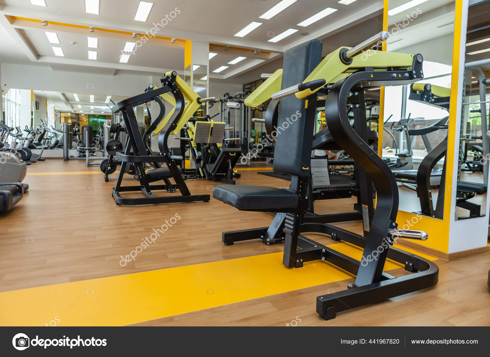 Modern Bright Gym Sports Equipment Gym People Fitness Exercise Machine  Stock Photo by ©split271992.gmail.com 441967820