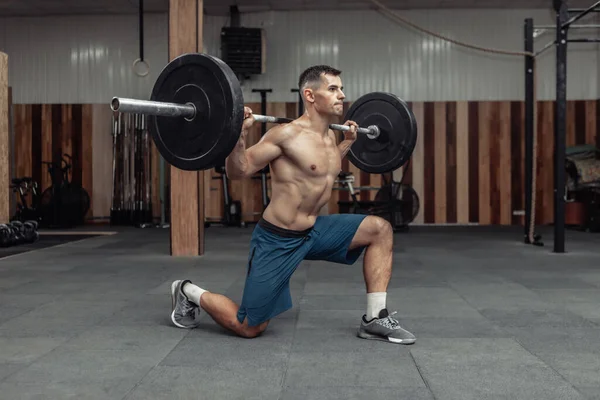 Young Muscular Male Bodybuilder Doing Lunges Barbell His Shoulders Modern — Stock Photo, Image