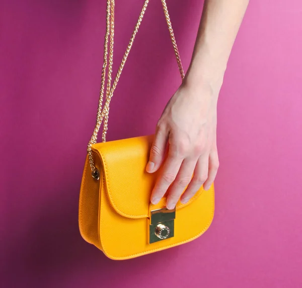 Female Hand Hold Opens Fashionable Yellow Leather Bag Golden Chain — Stock Photo, Image