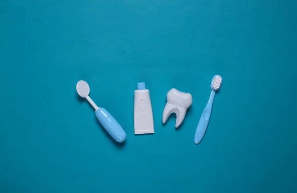 Toy Dentist Equipment Blue Background Top View Flat Lay — Stock Photo, Image