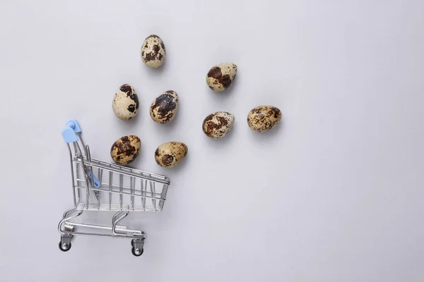 Mini Supermarket Cart Quail Eggs Gray Background Top View — Stock Photo, Image