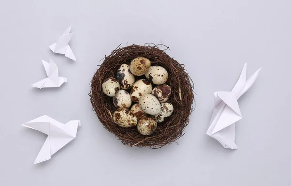 Easter Composition Origami Easter Bunny Doves Quail Eggs Nest Gray — Stock Photo, Image