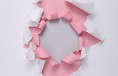 Empty torn hole of paper. Copy space
