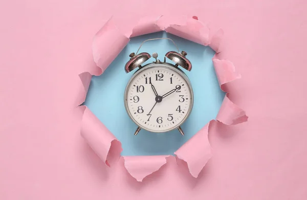 Alarm Clock Torn Hole Blue Pink Pastel Background Concept Art — Zdjęcie stockowe