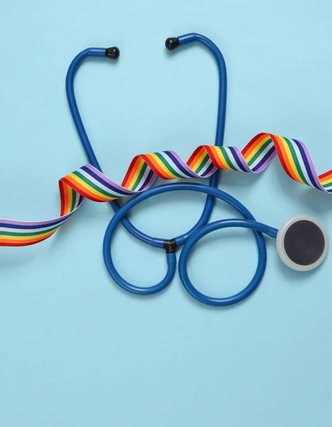 Rainbow Lgbt Ribbon Stethoscope Blue Background — Stock Photo, Image