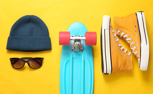 Hipster outfit on a yellow background. Youth flat lay still life