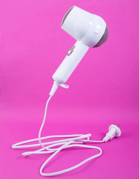 Levitating Hair Dryer Pink Background Minimalistic Beauty Fashion Still Life — Stock Photo, Image