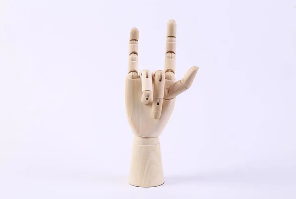 Mão Madeira Mostrando Gesto Rocha Fundo Branco — Fotografia de Stock