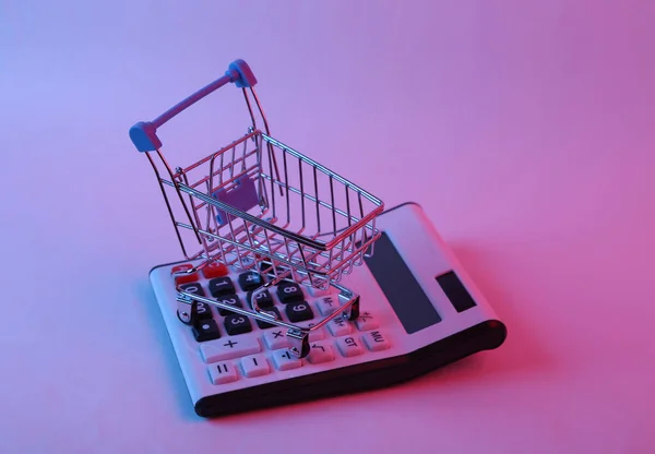 Taschenrechner Mit Einkaufswagen Rosa Blauem Neonlicht — Stockfoto