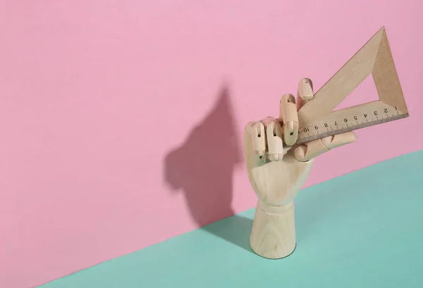 Wooden Hand Holding Triangle Ruler Blue Pink Pastel Background Trendy — 스톡 사진