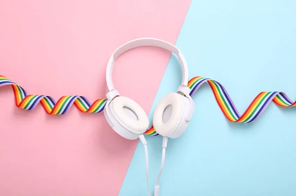 Stereo Headphones Lgbt Rainbow Ribbon Tape Blue Pink Background Top — Stock Photo, Image