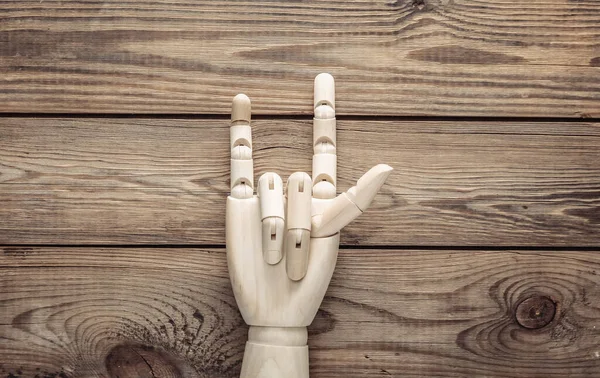 Ξύλινο Χέρι Δείχνει Ροκ Χειρονομία Ξύλινο Φόντο — Φωτογραφία Αρχείου