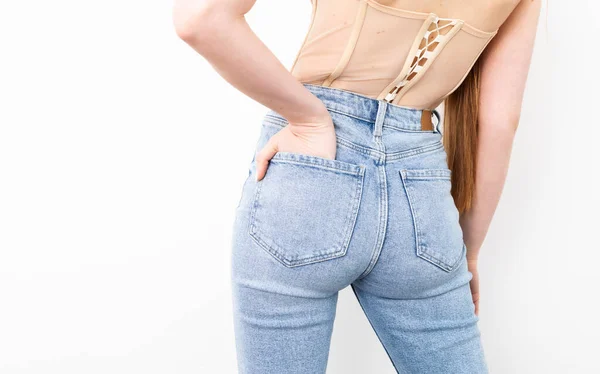 Woman Butt Tight Blue Jeans White Background — Stock fotografie