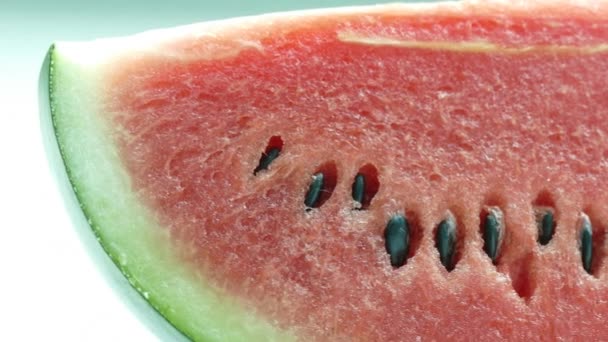 Slice of Watermelon fruit on table — Stock Video