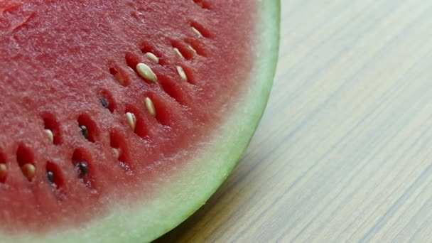 Slice of Watermelon fruit on table — Stock Video