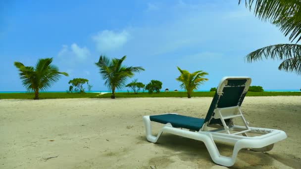 Deck chair with sea and beach — Stock Video