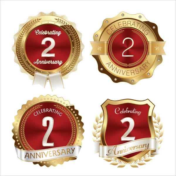 Distintivos de aniversário de ouro e vermelho 2 anos Celebração —  Vetores de Stock