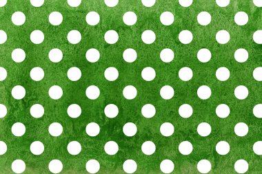 Yeşil suluboya arka plan üzerinde beyaz noktalar.