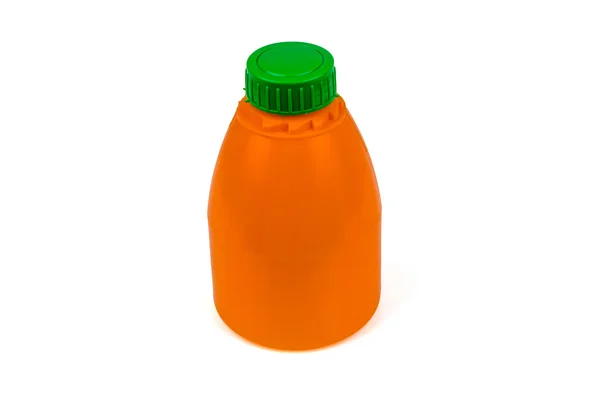 Orange plastflaska med gröna cup. — Stockfoto