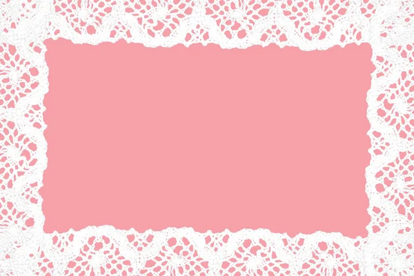 White lace on pink background. — Stock Photo, Image