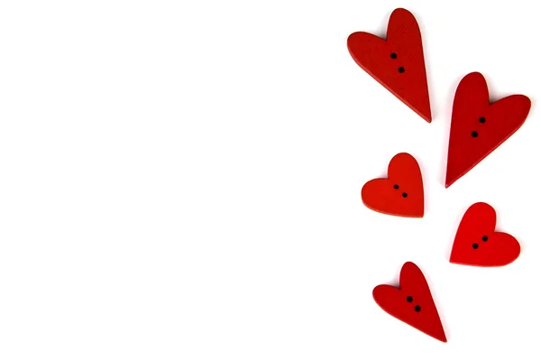 Två björnar med ballonger-hjärtan på vit bakgrund. Knappen bär kärlek. Knappen kärlek. Trä knappar. Vykort för Valentine. Valentines röda hjärtan. — Stockfoto