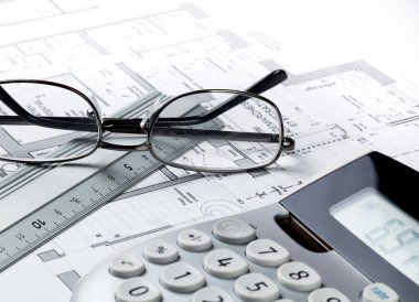 property design and cost concept with eyeglasses and calculator clipart