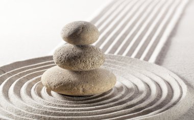 balanced pebbles in sand for meditation and contemplation clipart