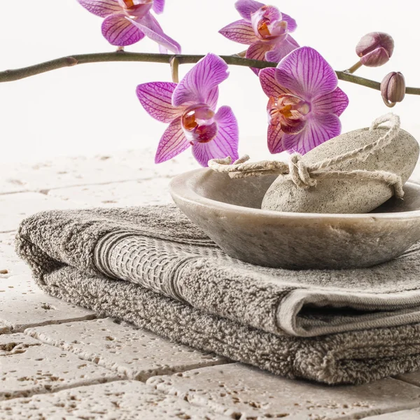 Cotton towel and pumice for spa treatment — Stock Photo, Image