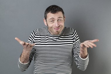 dubious 40s man holding blank banner for doubt or surprising advertising