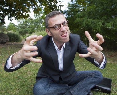 furious male businessman discussing about strategic leadership solutions outdoors